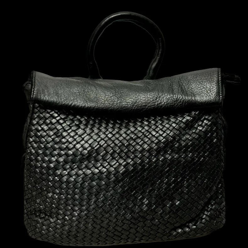 Handcrafted Backpack In Woven Leather
