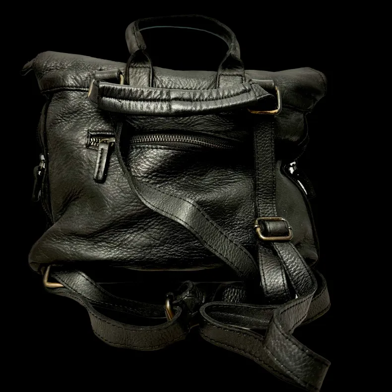 Handcrafted Backpack In Woven Leather